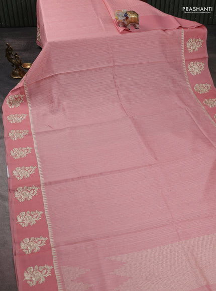 Jute silk saree peach shade with embroidery buttas and floral embroidery butta border