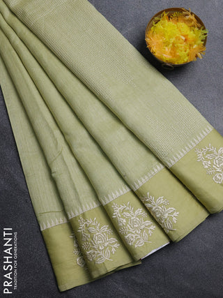 Jute silk saree pista green with embroidery buttas and floral embroidery butta border