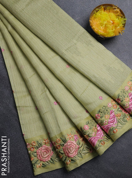 Jute silk saree pista green with embroidery buttas and parsi embroidery border