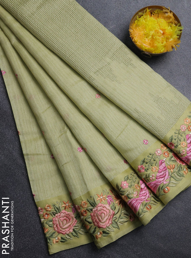 Jute silk saree pista green with embroidery buttas and parsi embroidery border