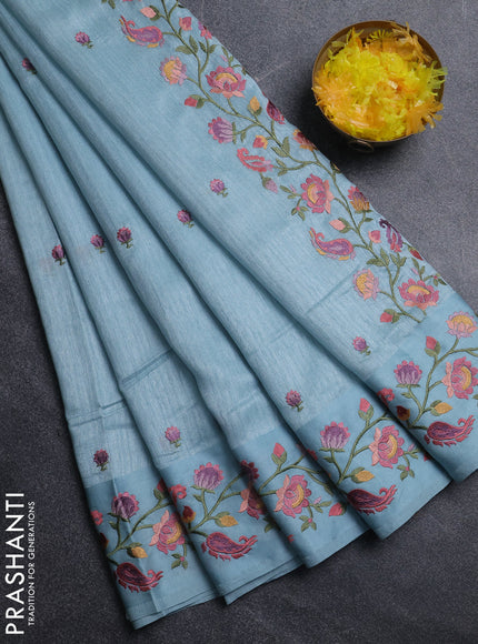 Jute silk saree pastel blue with embroidery buttas and floral embroidery butta border