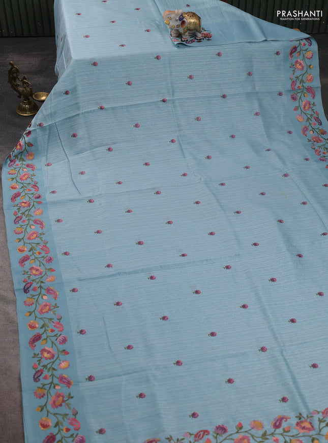 Jute silk saree pastel blue with embroidery buttas and floral embroidery butta border