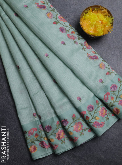 Jute silk saree pastel green with embroidery buttas and floral embroidery butta border