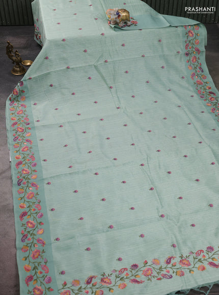 Jute silk saree pastel green with embroidery buttas and floral embroidery butta border