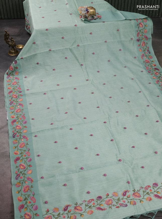 Jute silk saree pastel green with embroidery buttas and floral embroidery butta border