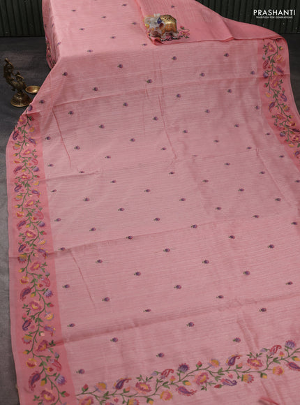 Jute silk saree peach shade with embroidery buttas and floral embroidery butta border