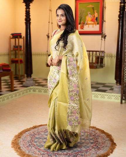 Jute silk saree pista green with embroidery buttas and long parsi embroidery simple border