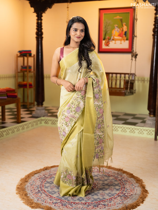 Jute silk saree pista green with embroidery buttas and long parsi embroidery simple border