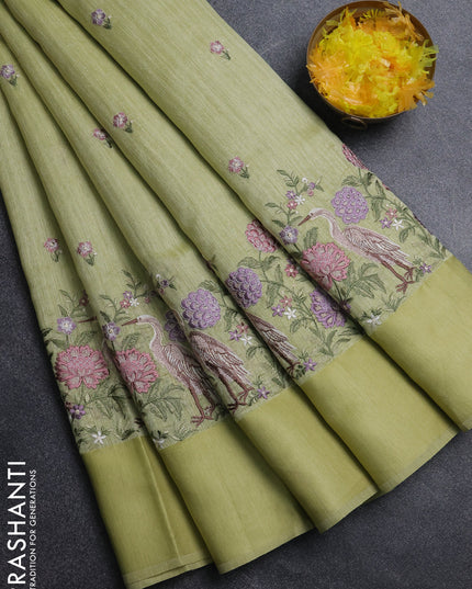 Jute silk saree pista green with embroidery buttas and long parsi embroidery simple border