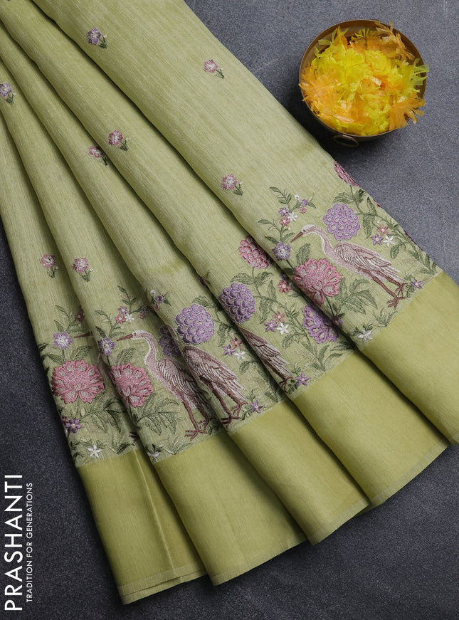 Jute silk saree pista green with embroidery buttas and long parsi embroidery simple border