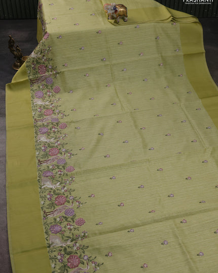 Jute silk saree pista green with embroidery buttas and long parsi embroidery simple border