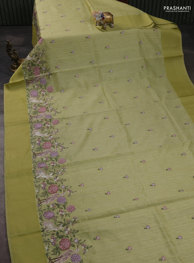 Jute silk saree pista green with embroidery buttas and long parsi embroidery simple border