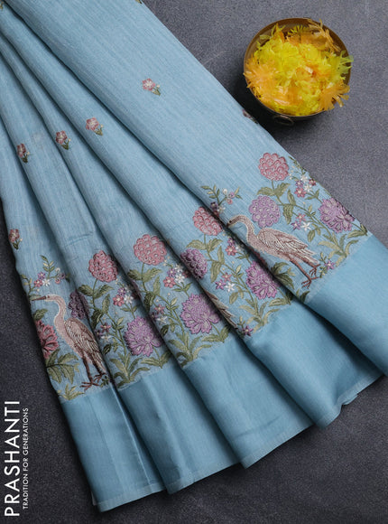Jute silk saree pastel blue and  with embroidery buttas and long parsi embroidery simple border