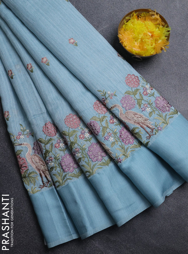 Jute silk saree pastel blue and  with embroidery buttas and long parsi embroidery simple border