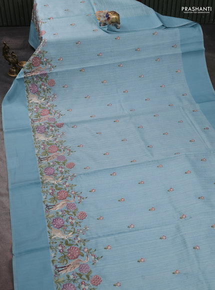 Jute silk saree pastel blue and  with embroidery buttas and long parsi embroidery simple border
