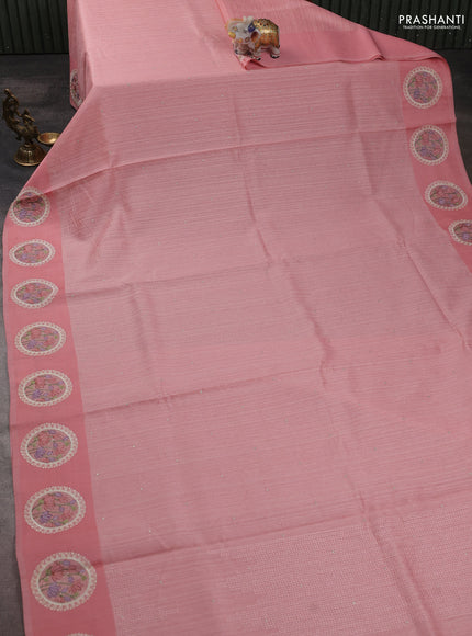 Jute silk saree peach shade with embroidery buttas and floral embroidery butta border