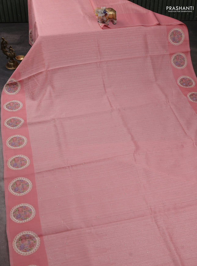 Jute silk saree peach shade with embroidery buttas and floral embroidery butta border