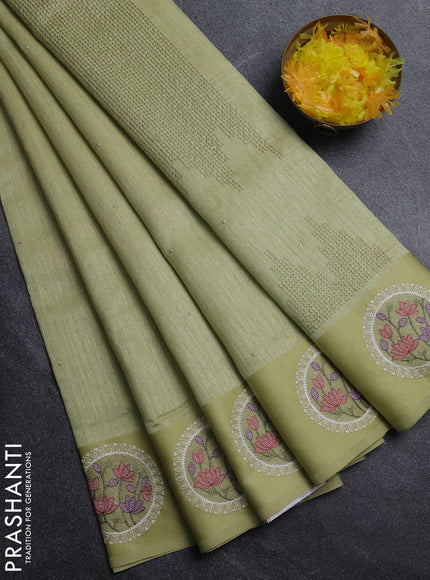 Jute silk saree pista green with embroidery buttas and floral embroidery butta border