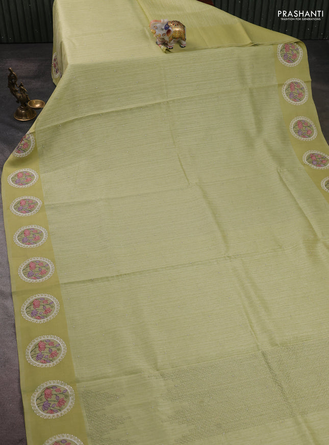 Jute silk saree pista green with embroidery buttas and floral embroidery butta border