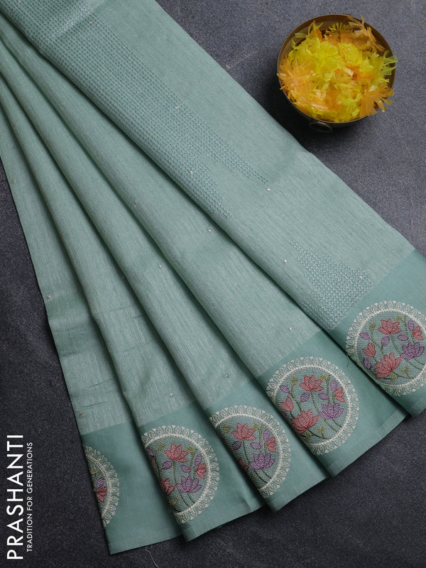 Jute silk saree pastel green with embroidery buttas and floral embroidery butta border