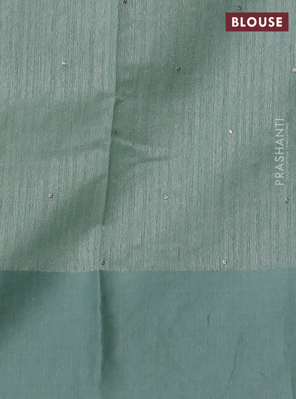 Jute silk saree pastel green with embroidery buttas and floral embroidery butta border
