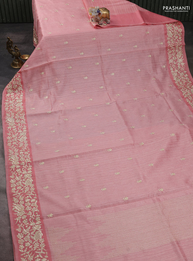 Jute silk saree peach shade with embroidery buttas and embroidery border