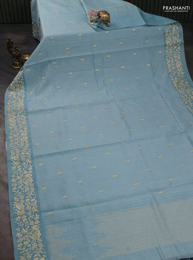 Jute silk saree pastel blue with embroidery buttas and embroidery border