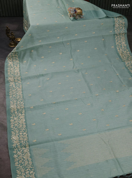 Jute silk saree pastel green with embroidery buttas and embroidery border