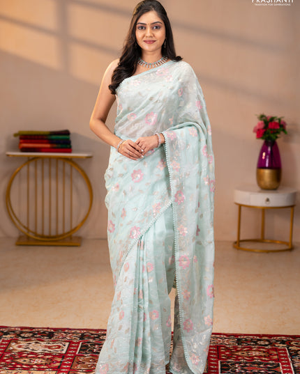 Pure organza silk saree pastel blue shade with allover embroidery sequin work and embroidery crocia lace work border