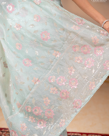 Pure organza silk saree pastel blue shade with allover embroidery sequin work and embroidery crocia lace work border
