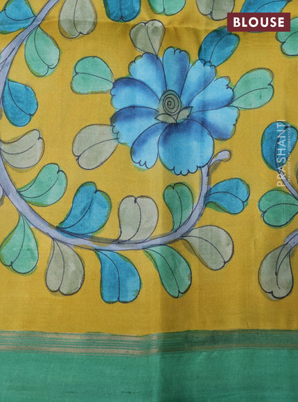 Pure soft silk saree dark green and yellow with plain body and kalamkari hand printed pallu