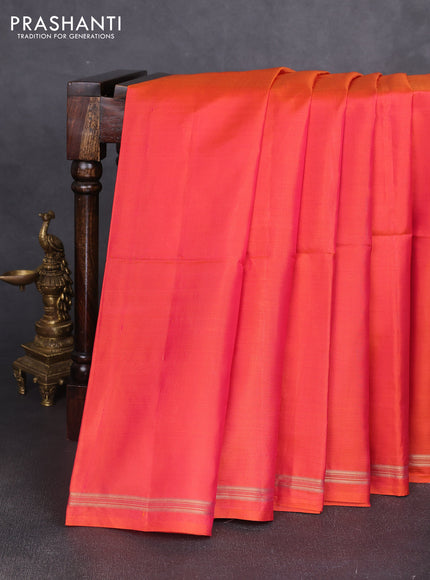 Pure soft silk saree dual shade of pinkish orange and yellow with kalamkari hand painted prints and kalamkari hand printed pallu