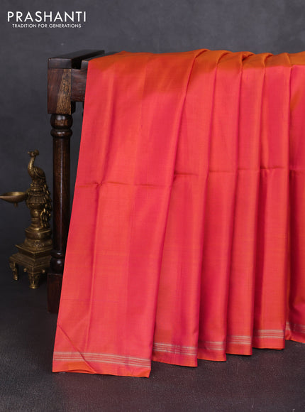 Pure soft silk saree dual shade of pinkish orange and teal blue with plain body and kalamkari hand printed pallu