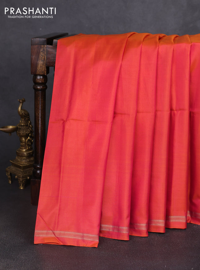 Pure soft silk saree dual shade of pinkish orange and teal blue with plain body and kalamkari hand printed pallu