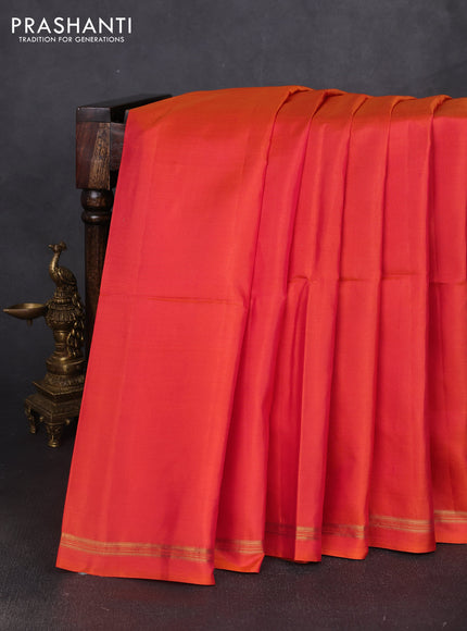 Pure soft silk saree dual shade of pinkish orange and pastel green with plain body and kalamkari hand printed pallu