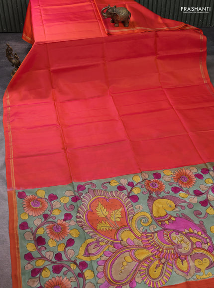 Pure soft silk saree dual shade of pinkish orange and pastel green with plain body and kalamkari hand printed pallu