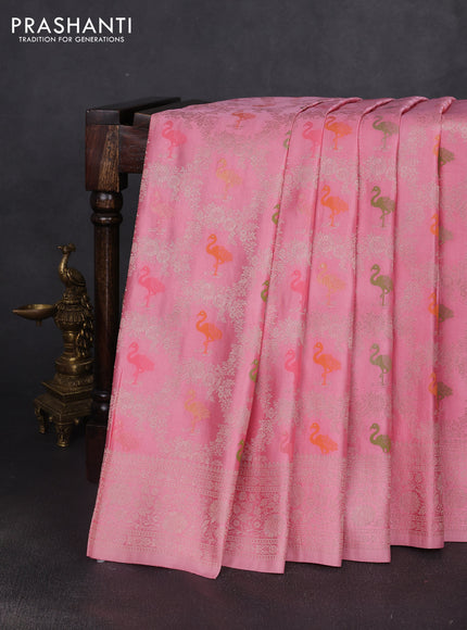 Banarasi silk saree mild peach pink with allover zari woven brocade weaves and zari woven border