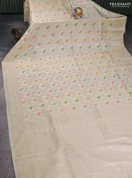 Banarasi silk saree cream with allover zari woven brocade weaves and zari woven border