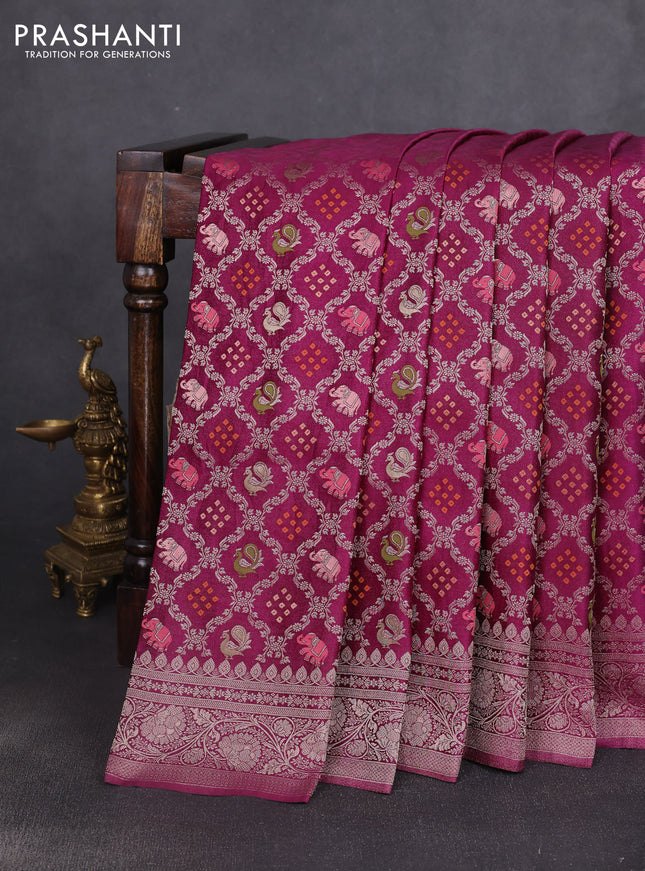Banarasi silk saree wine shade with allover zari woven brocade weaves and zari woven border