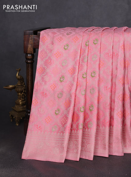 Banarasi silk saree mild peach pink with allover zari woven brocade weaves and zari woven border