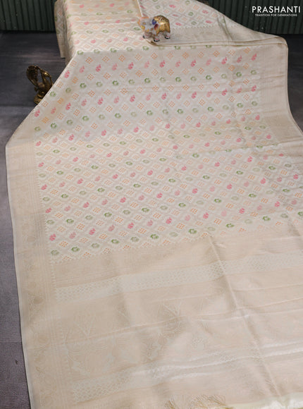 Banarasi silk saree cream with allover zari woven brocade weaves and zari woven border