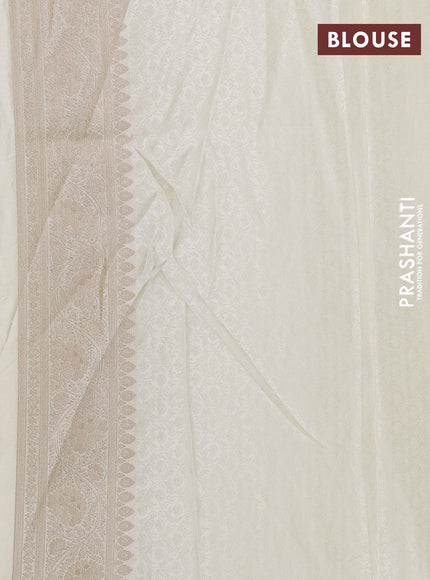 Banarasi silk saree cream with allover zari woven brocade weaves and zari woven border