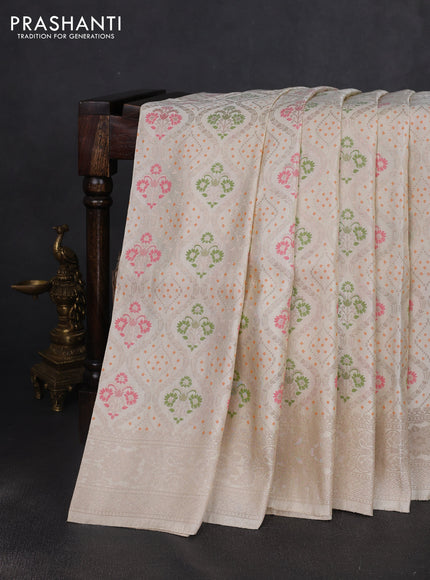 Banarasi silk saree cream with allover zari woven brocade weaves and zari woven border