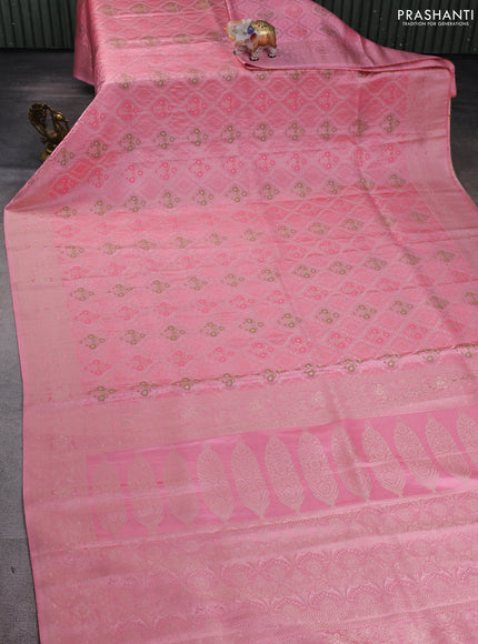 Banarasi silk saree mild peach pink with allover zari woven brocade weaves and zari woven border