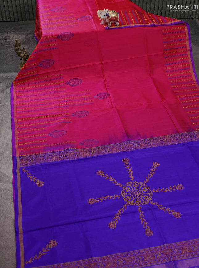 Uppada block printed saree dual shade of pinkish orange and royal blue with prints and small zari woven border