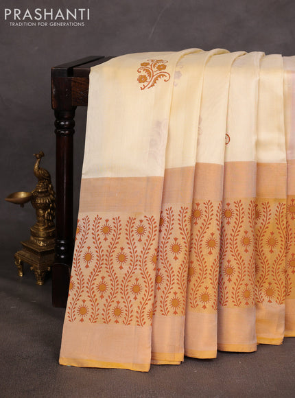 Uppada block printed saree cream and pale yellow with butta prints and long printed zari woven border