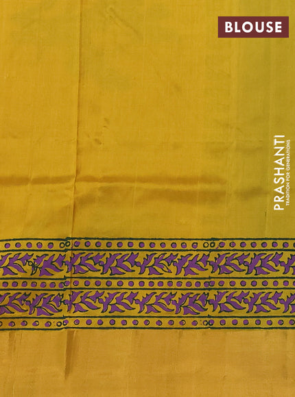 Uppada block printed saree bottle green and mustard yellow with prints and zari woven border