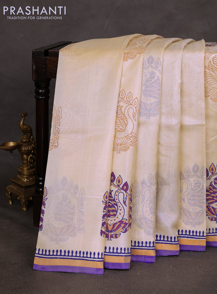 Uppada block printed saree off white and violet with butta prints and printed border
