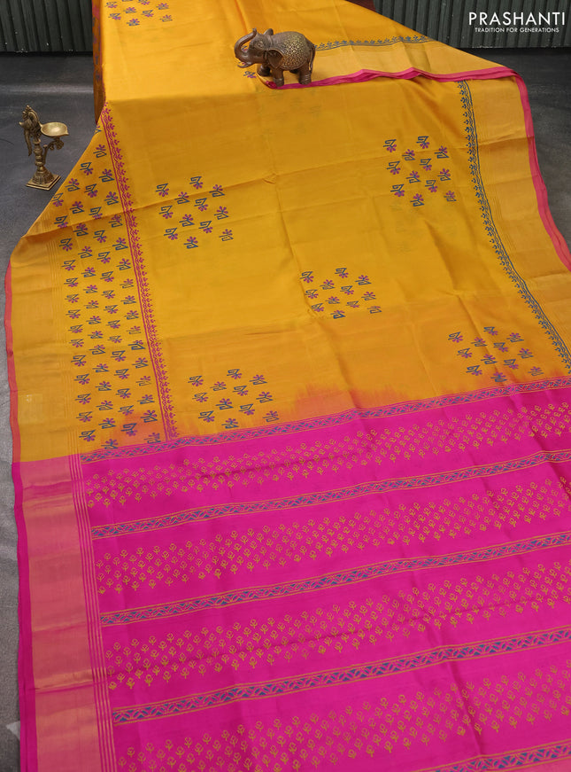 Uppada block printed saree mustard yellow and pink with butta prints and long printed zari woven border