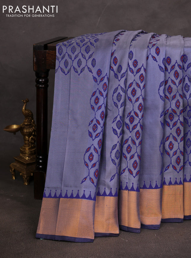 Uppada block printed saree greyish blue and navy blue with prints and zari woven border